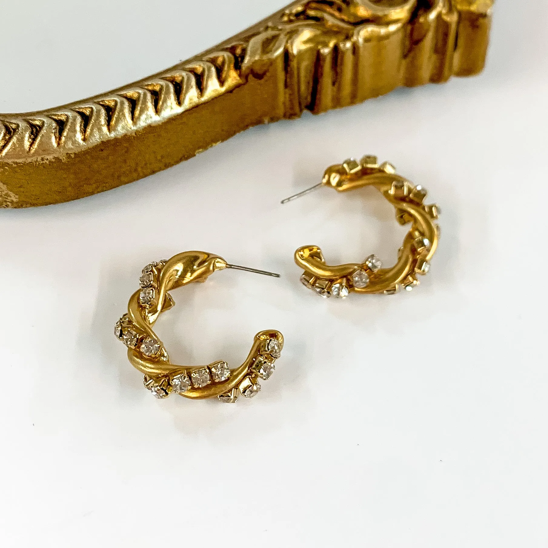 Gold Tone Twisted Hoop Earrings with Clear Crystals