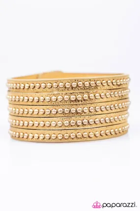 Open Door Jewelry - Big Hitter - Gold Bracelet - Paparazzi Accessories