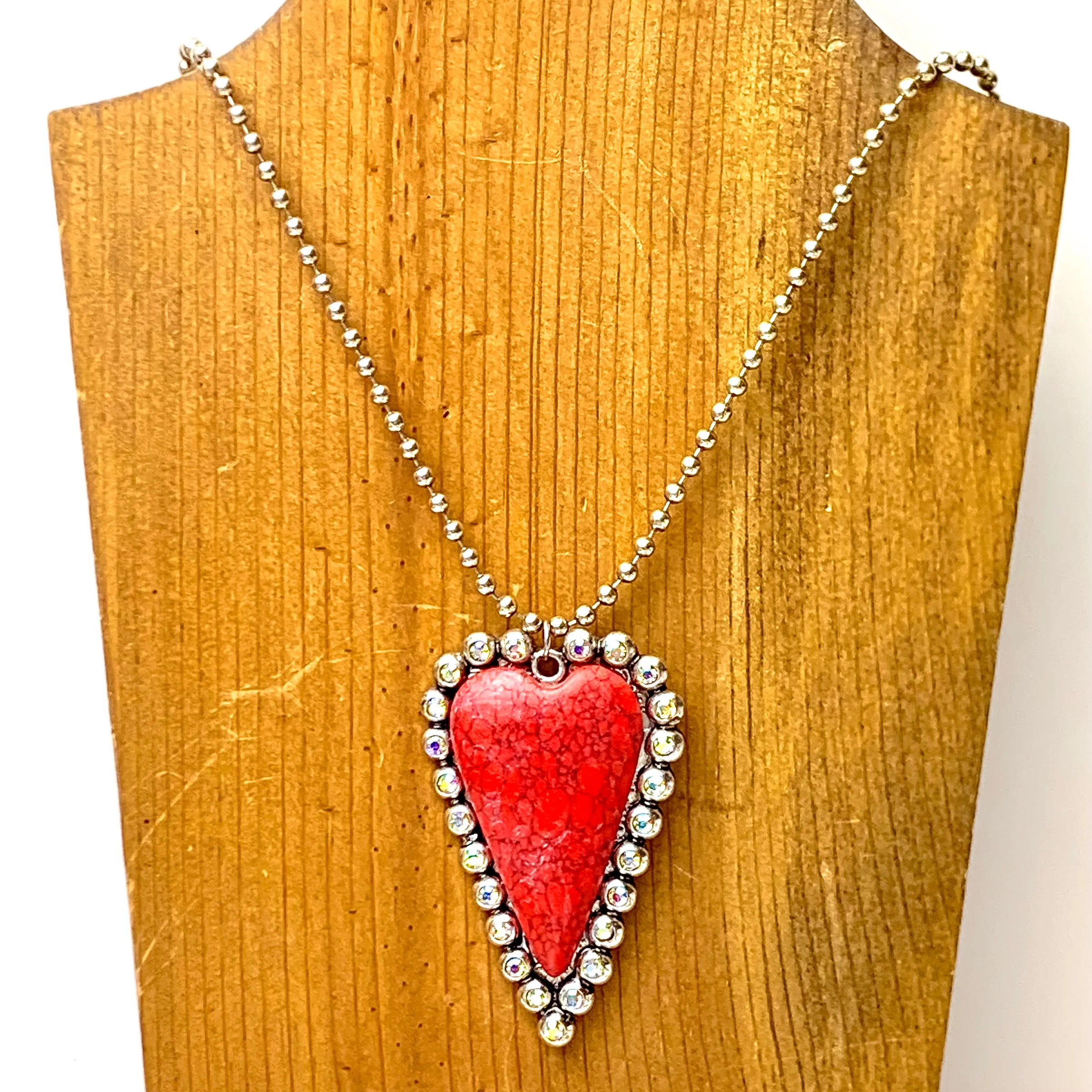 Silver Beaded Necklace With Faux Stone Heart Pendant and AB Crystal Border Accents in Red